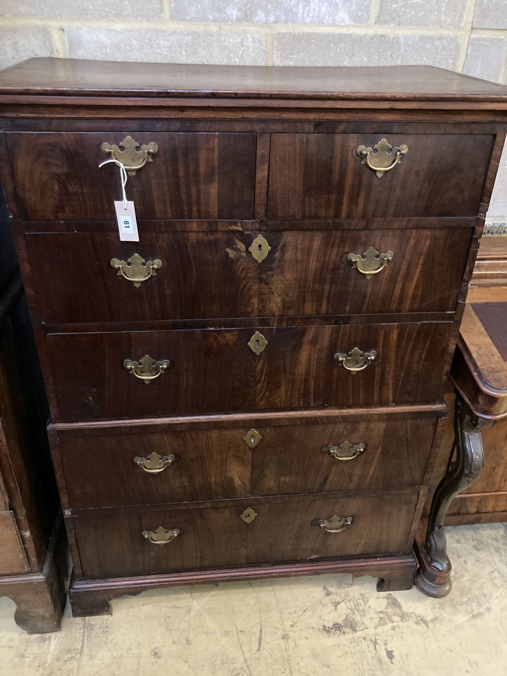 An 18th century oak and walnut chest on chest, width 92cm depth 47cm height 130cm